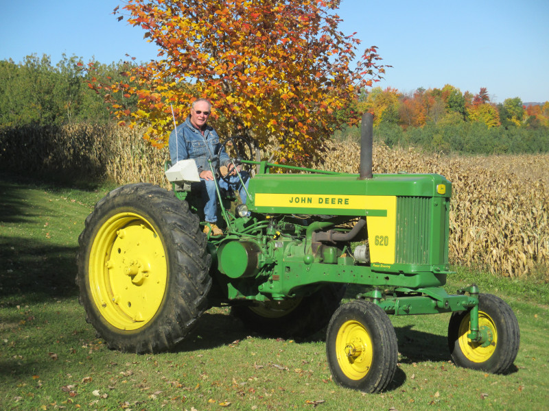 Douglas Fisk with a John Deere 620.